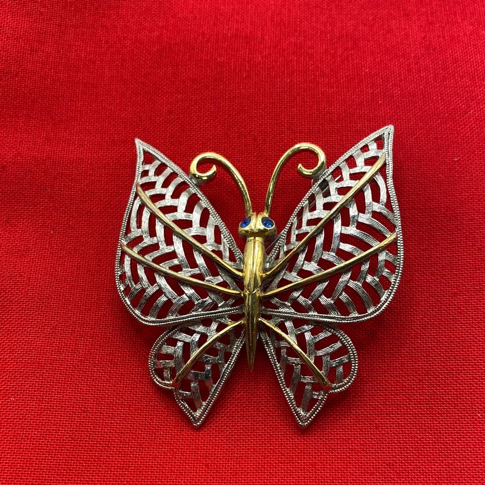 Vintage Avon Silver and Gold Tone Butterfly Brooch with Blue Rhinestone Eyes